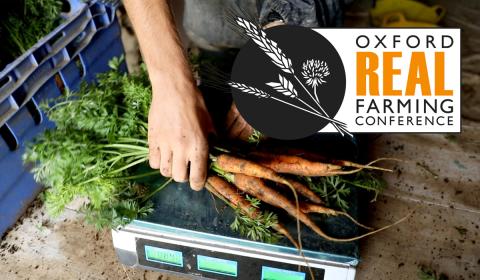 Oxford Real Farming Conference image with hands holding carrots and the conference logo